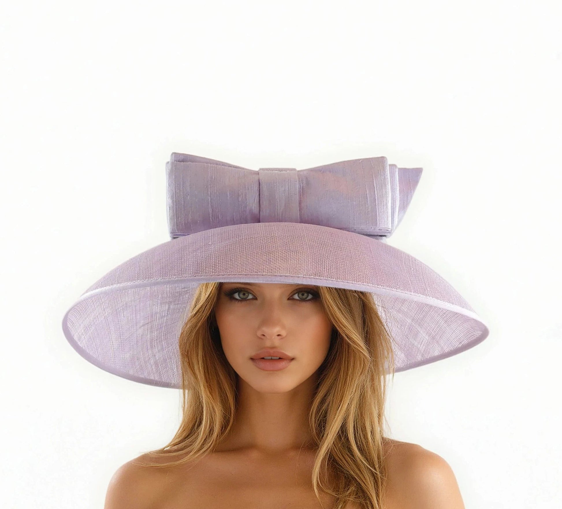 Astrid - Statement Hat With SIlk Bow For Ascot, Weddings & Luncheons worn by woman with loose hair in soft lighting