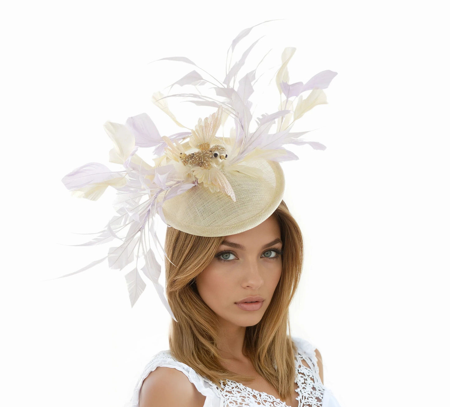 Elegant woman wearing Holly – Feather Fascinator Hat for Kentucky Derby, Ascot & Weddings with delicate feathers and bird detail