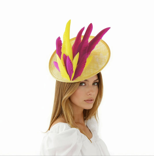 Woman wearing Lydia Colorful Saucer Fascinator – Statement Race Day Hat with yellow base and pink and yellow feathers