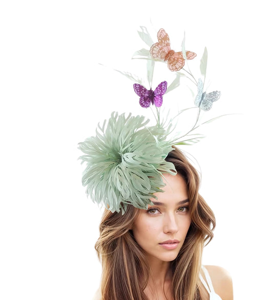 Woman wearing Stella Feather Wedding Formal Ocassion Fsacinator Headband with butterflies and feathers in soft green and pastel colors